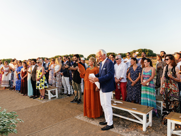 Guests reacting during three-day wedding ceremony in Antiparos.