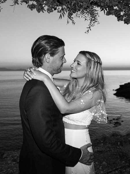 Black and white wedding portrait by the sea in Antiparos.