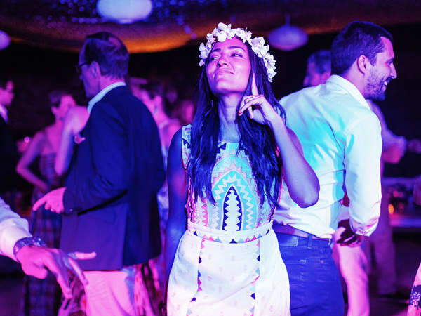Guests dancing during outdoor wedding party in Antiparos.