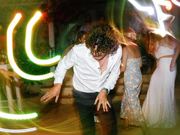 Dance floor motion blur during Antiparos destination wedding.