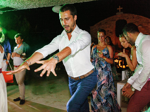 Guest dancing at night reception in Antiparos.