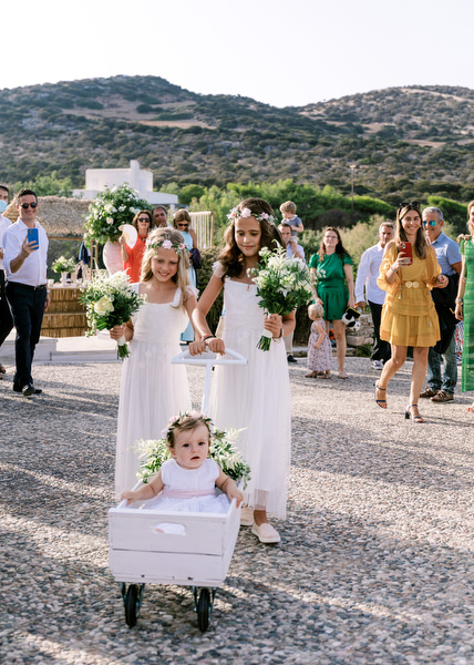 Flower girls at Antiparos Greek island wedding ceremony.