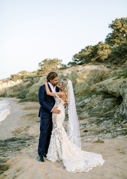 Bride and groom portrait by the sea in Antiparos.