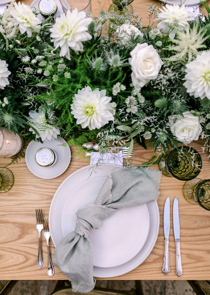 Elegant white and green wedding tablescape in Antiparos.