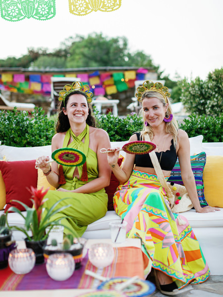 Guests enjoying welcome drinks at Antiparos pre-wedding fiesta