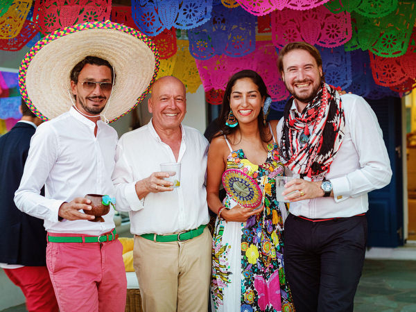 Friends celebrating together at Mexican fiesta pre-wedding party