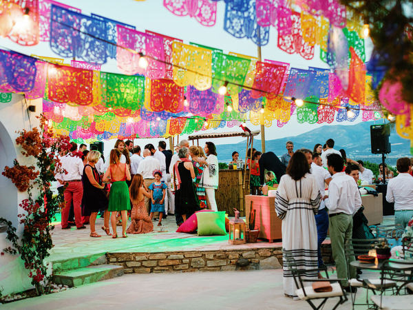 Guests celebrating and dancing at Antiparos pre-wedding fiesta