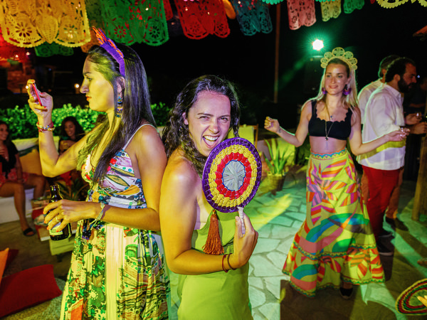 Female dancing at Mexican fiesta pre-wedding party
