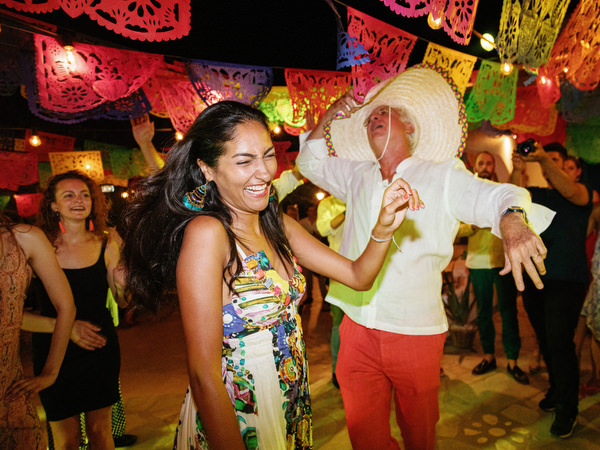 Guests celebrating with drinks at Antiparos fiesta party