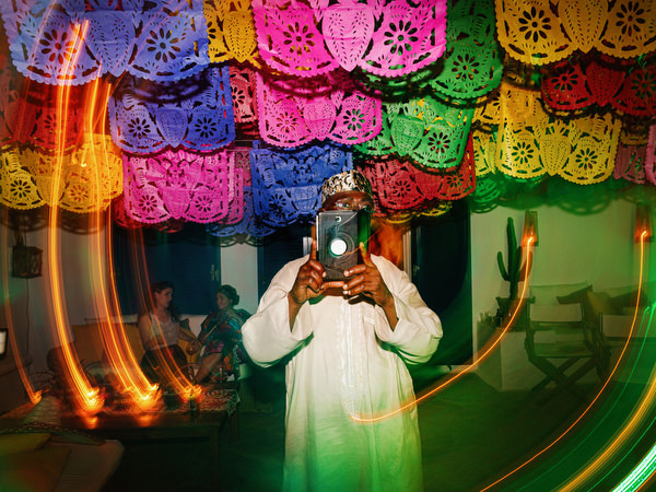Creative motion dance photo from Mexican fiesta pre-wedding party