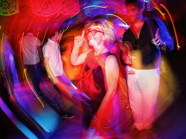 Creative motion dance photo from Mexican fiesta pre-wedding party