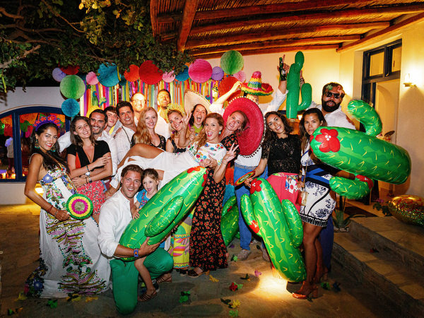 Guests celebrating together during Antiparos pre-wedding fiesta