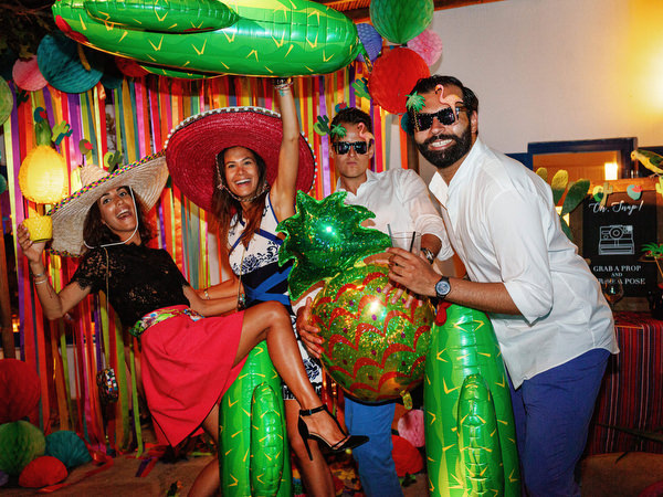 Guests celebrating together during Antiparos pre-wedding fiesta
