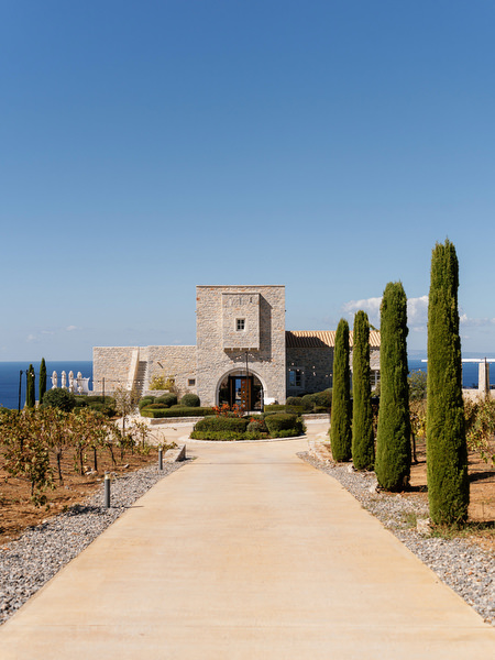 Entrance pathway at Aria Estate destination wedding venue in Greece
