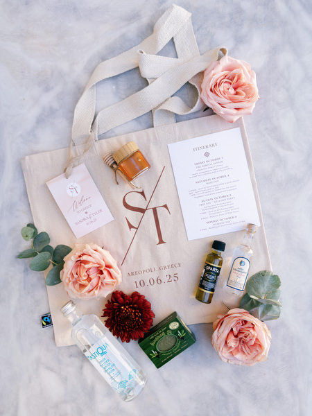 Wedding invitation flat lay for Aria Estate destination wedding in Greece