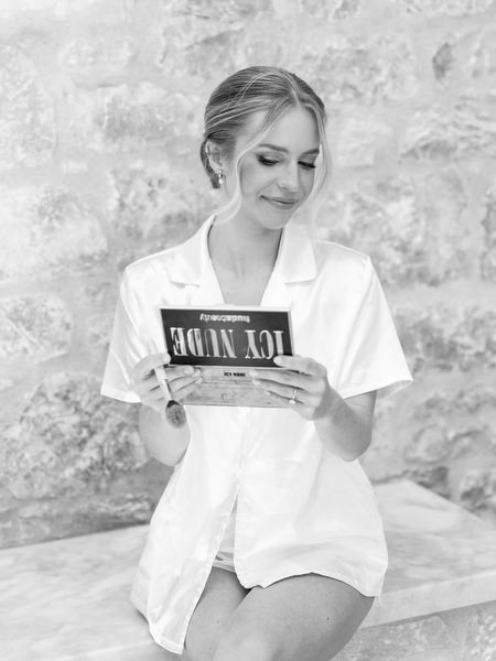 Black-and-white bridal preparation moment at Aria Estate