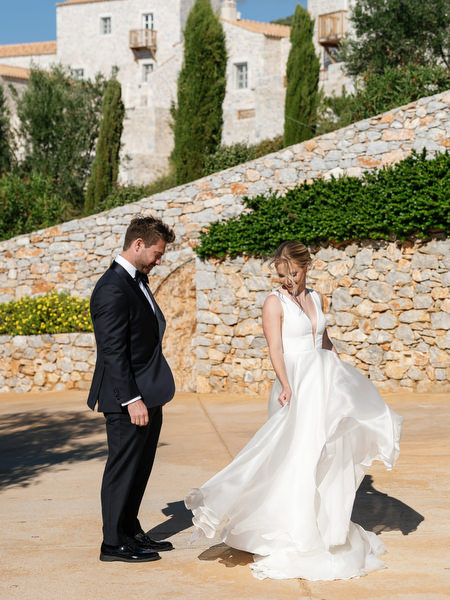 Bride twirling during Aria Estate destination wedding in Greece
