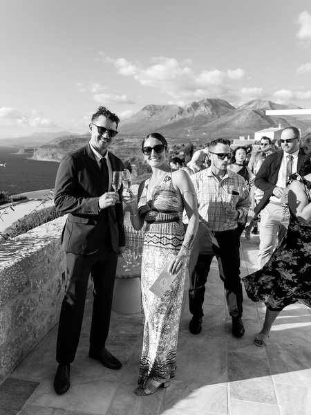 Guests enjoying cocktail hour at Aria Estate wedding in Greece