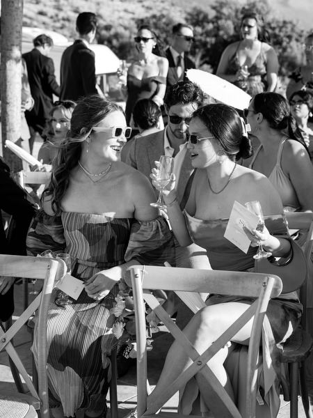 Wedding guests seated at outdoor ceremony at Aria Estate in the Peloponnese