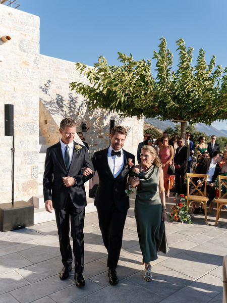 Family walking down the aisle at Aria Estate outdoor wedding ceremony