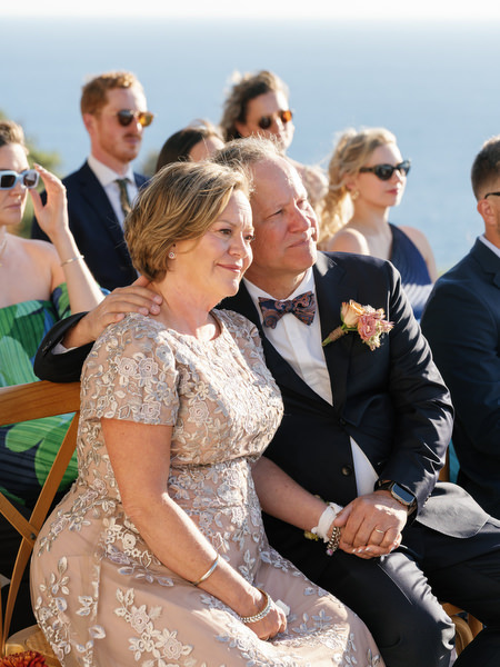 Emotional parent reaction during Aria Estate wedding ceremony in the Peloponnese