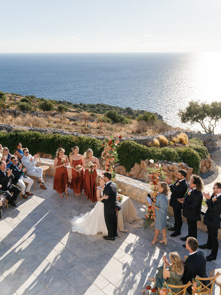 Outdoor wedding ceremony at Aria Estate overlooking the Mediterranean Sea