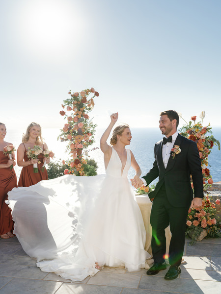Bride and groom celebrating after ceremony at Aria Estate wedding in Greece
