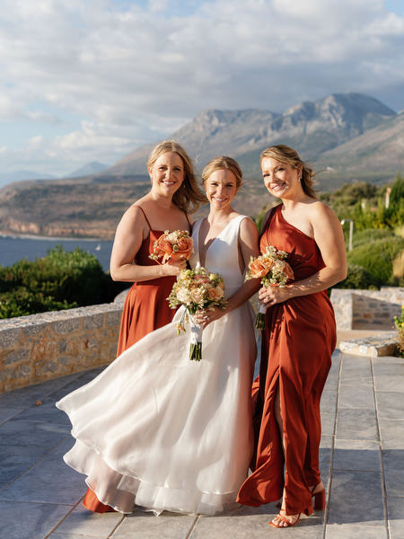 Bride with bridesmaids at Aria Estate wedding overlooking the Peloponnese mountains
