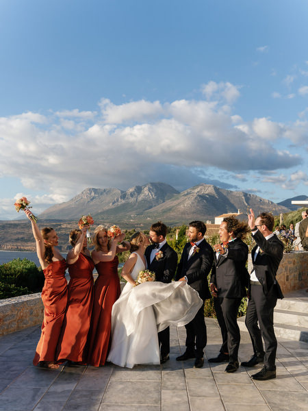 Bridal party celebrating at Aria Estate destination wedding in Greece