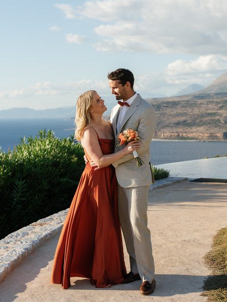 Wedding guest couple portrait at Aria Estate overlooking the Mediterranean