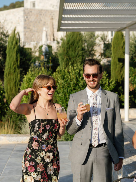 Guests enjoying sunset cocktail hour at Aria Estate in the Peloponnese