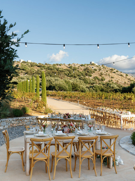 Outdoor wedding reception at Aria Estate with vineyard views