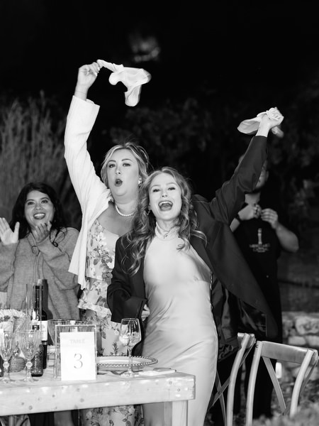 Wedding guests celebrating at Aria Estate night reception