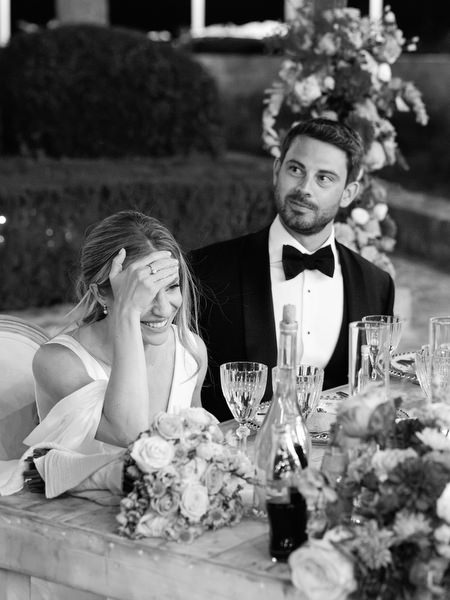 Bride reacting during wedding speech at Aria Estate