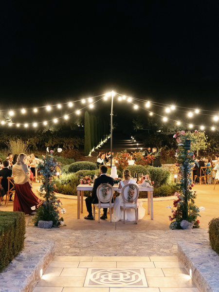 Outdoor wedding reception at Aria Estate under fairy lights