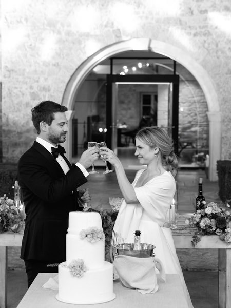 Wedding cake toast at Aria Estate night reception