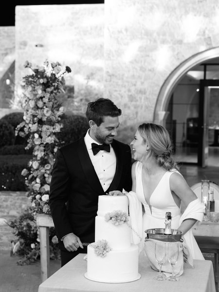 Wedding cake cutting at Aria Estate destination wedding