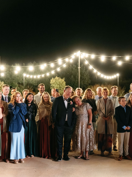 Wedding guests watching first dance at Aria Estate Greece