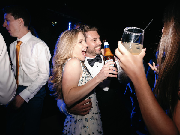 Bride and groom during Aria Estate night party
