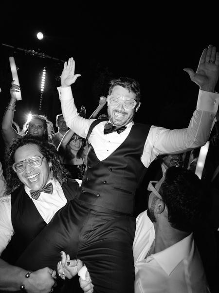 Wedding guests enjoying reception at Aria Estate Greece