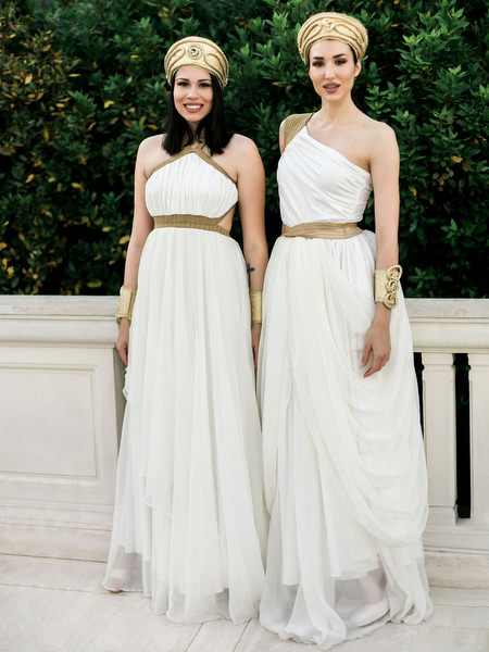 Two women in Grecian style dresses at Athens pre-wedding celebration
