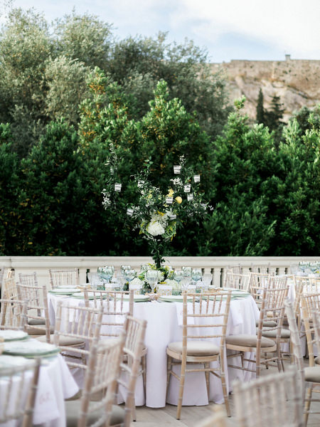 Elegant dinner setup with Acropolis view for luxury Athens wedding