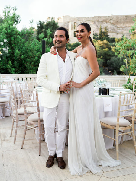 Couple portrait with Acropolis backdrop during pre-wedding celebration