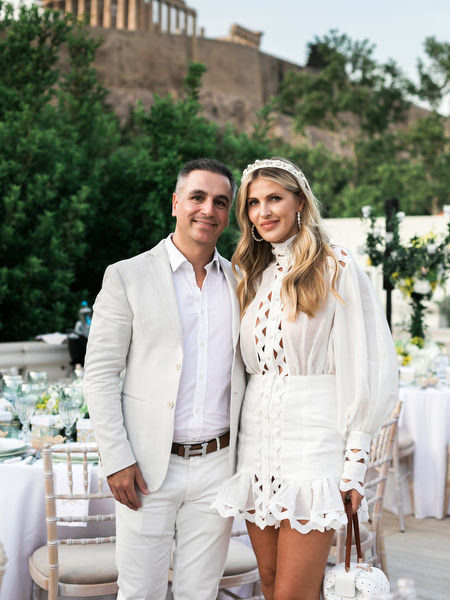 Couple portrait with sunset colors over Athens