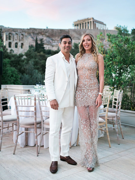 Couple portrait at sunset with Acropolis in background