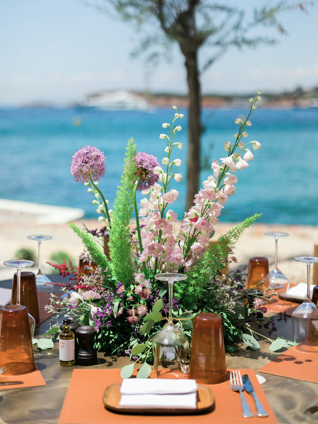 Floral centerpiece with sea view at post-wedding brunch in Athens