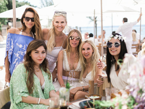 Bride and friends posing together at Four Seasons Astir Palace