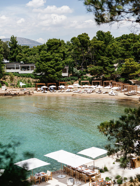Private beach cove at Four Seasons Astir Palace in Greece, part of a refined Athens Riviera wedding setting