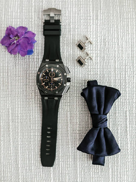 Groom’s details including luxury watch and bow tie styled for an elegant Athens wedding at Four Seasons Astir Palace