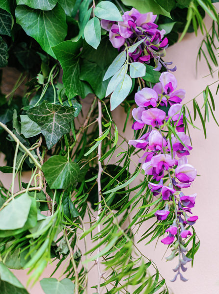 Purple and green floral installation designed for a couture Island Resort Athens Riviera wedding on the Athens Riviera